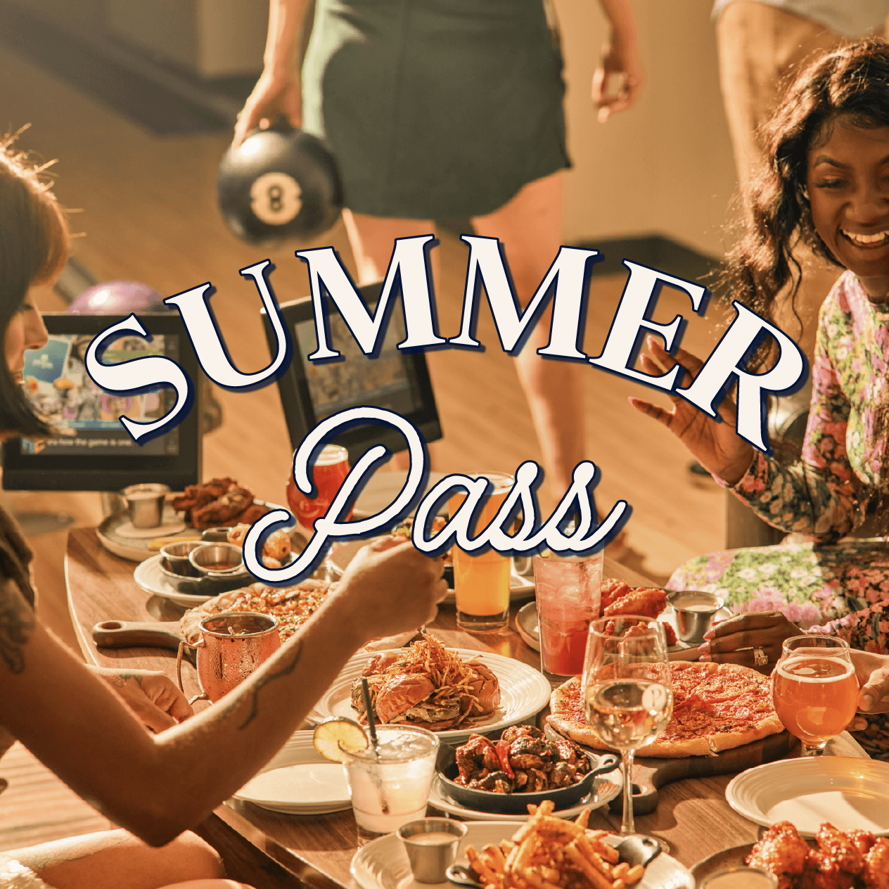 Friends laughing on the bowling lanes at Pinstripes, with one holding a bowling ball and two sharing bistro plates; the Summer Pass promo text “Summer Pass” appears overlaid on the image.